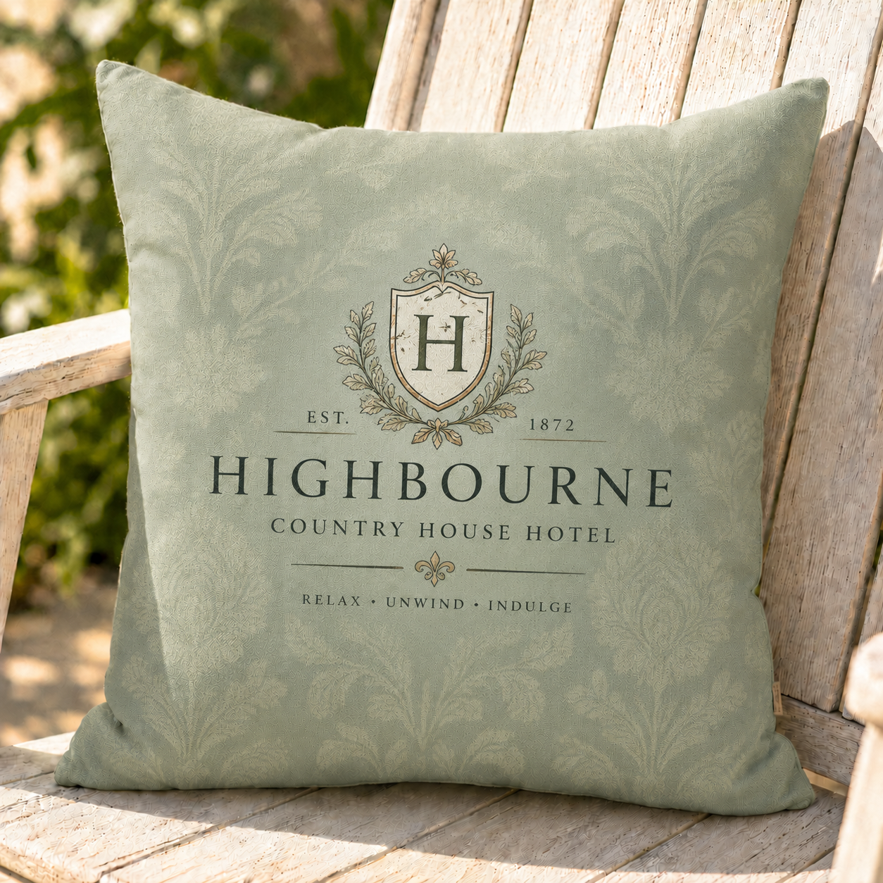 Cushion on an outdoor chair showing a country house crest