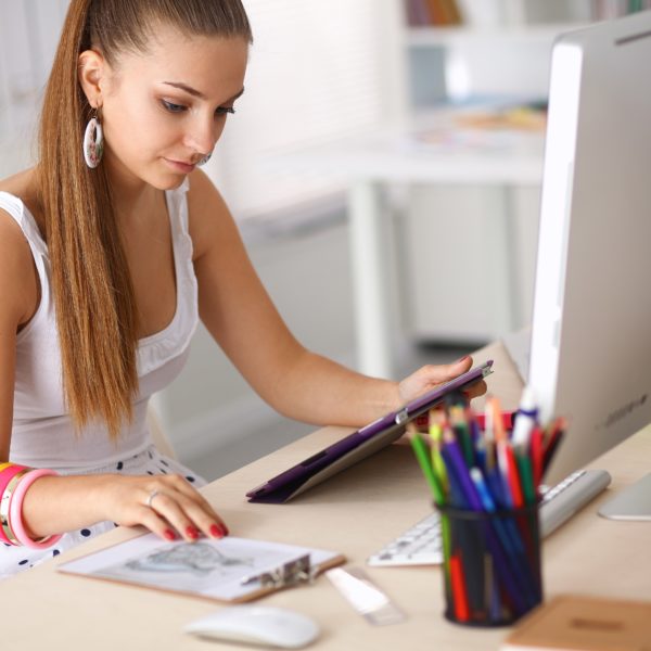 Woman checking fabric prices