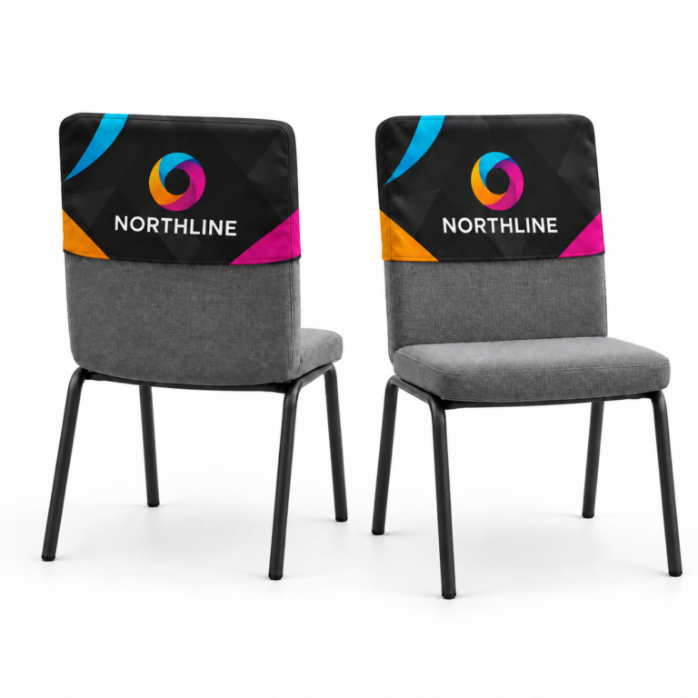 Front and rear views of black all-over printed chair caps with colourful geometric artwork and a Northline logo on both faces.